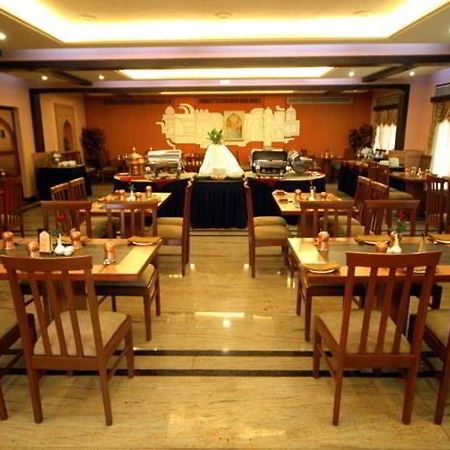 Aj International Hotel Bangalore Restoran gambar